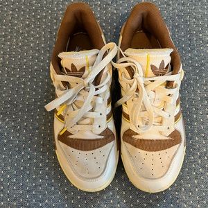 White Adidas sneakers, brown accents. Size 6 (men’s).